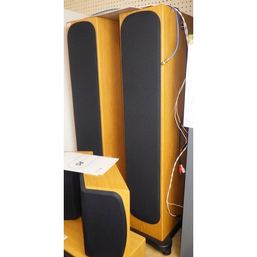 152 - A pair of floor standing Monitor Audio speakers together with three smaller speakers (5)