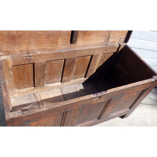 620 - A three panel oak coffer, 145cm wide