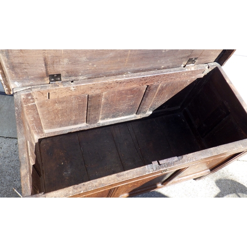 630 - A three panel oak coffer 112cm wide
