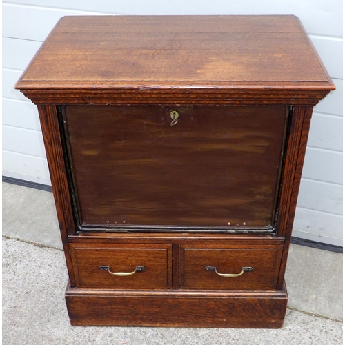 641 - An Edwardian oak secure cabinet with metal fall, 70cm wide, marks, ex Slaley Hall, Northumberland