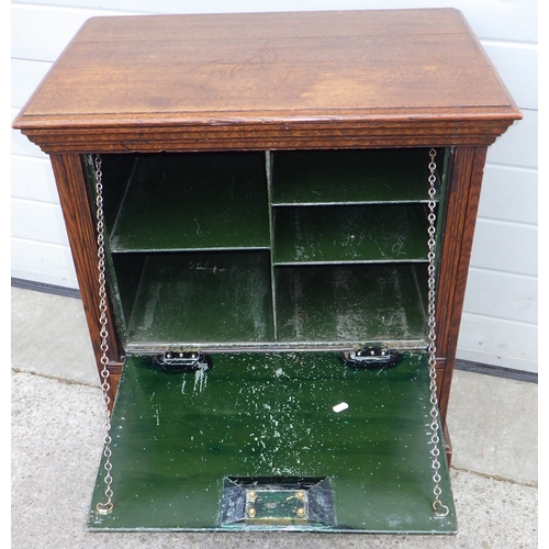 641 - An Edwardian oak secure cabinet with metal fall, 70cm wide, marks, ex Slaley Hall, Northumberland