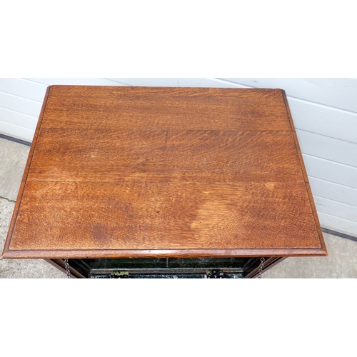 641 - An Edwardian oak secure cabinet with metal fall, 70cm wide, marks, ex Slaley Hall, Northumberland