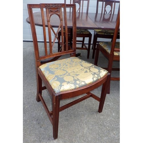 642 - A mahogany twin pillar dining table with one leaf, 226cm long x 107cm, together with a set of seven ... 