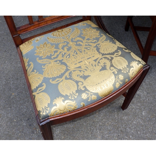642 - A mahogany twin pillar dining table with one leaf, 226cm long x 107cm, together with a set of seven ... 