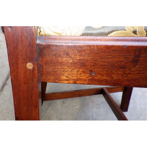 642 - A mahogany twin pillar dining table with one leaf, 226cm long x 107cm, together with a set of seven ... 