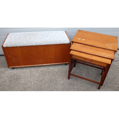 707 - A teak nest of three occasional tables, with drawer,  together with an ottoman (2)