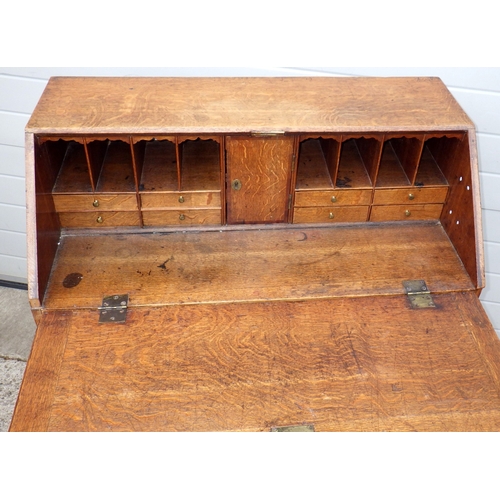 708 - A Geo III oak bureau, 99cm wide