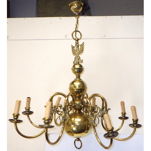 A large Flemish style 8 arm brass chandelier, approx 90cm drop