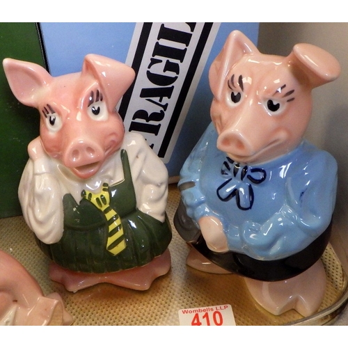 A set of five Nat West Wade pigs