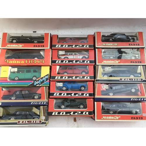 150 - A collection of boxed Russian manufactured Diecast vehicles, including cars