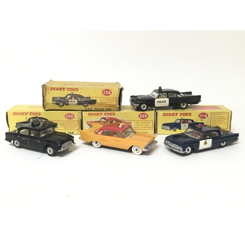 2048 - Dinky toys, #258 USA police car, #256 Police patrol car, #264 RCMP patrol car and #265 Plymouth USA ... 