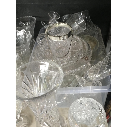 10 - A large collection of cut glass vases bowls dishes a lamp shade and other glass ware (a lot) NO RESE... 