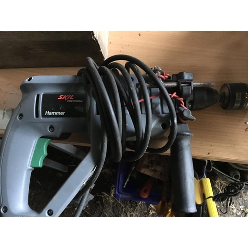 105 - A Bosch circular saw one other circular saw a Bosch grinder sander and other tools. and Skil hammer ... 