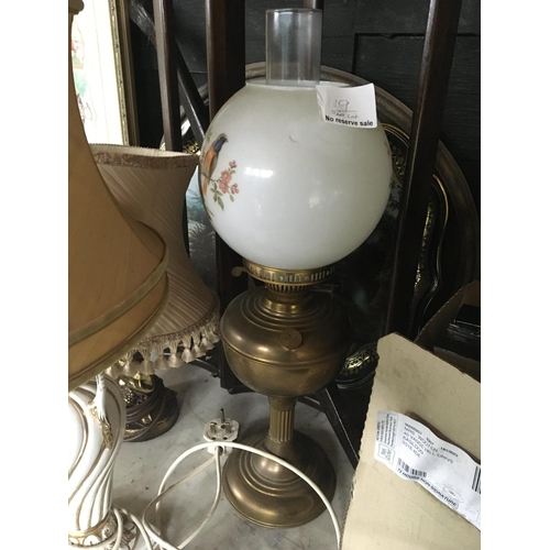 19 - A pair of ceramic classical style table lamps Hight 50cm a brass lamp in the form of a cherub a oil ... 