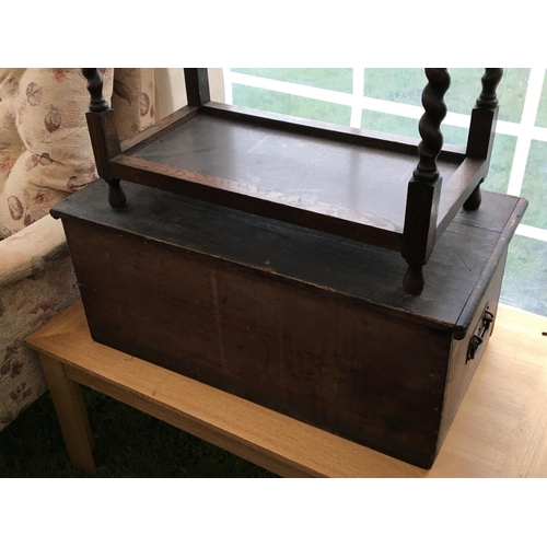 194 - A Mahogany Canterbury, damaged leg an oak storage table with hinged lid  and barley twist supports a... 