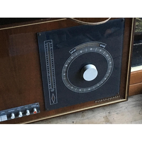 2 - A Vintage radio With a walnut polished case the music - center  In good good condition. 79x32cm