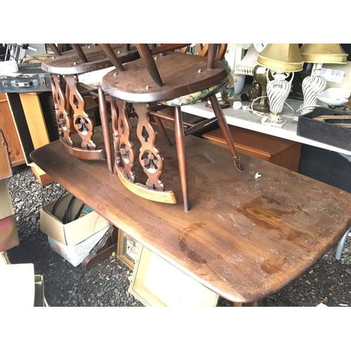 22 - An Ercol cottage style dining table with a set of four chairs