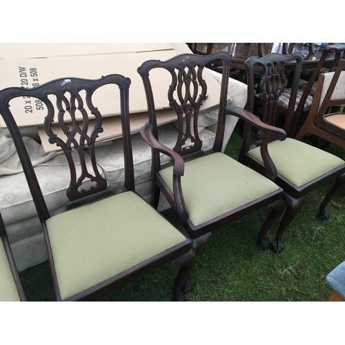 261 - A set of Eight George Ill style mahogany dining chairs with drop in seats on cabriole legs including... 