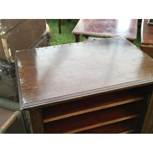 266 - A Mahogany music cabinet with a fitted interior.