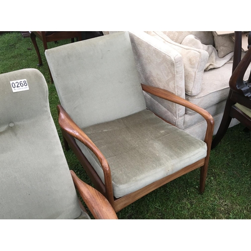 268 - Two modern design Teak Arm chairs one reclining with shaped arms Possibly Danish. (2)