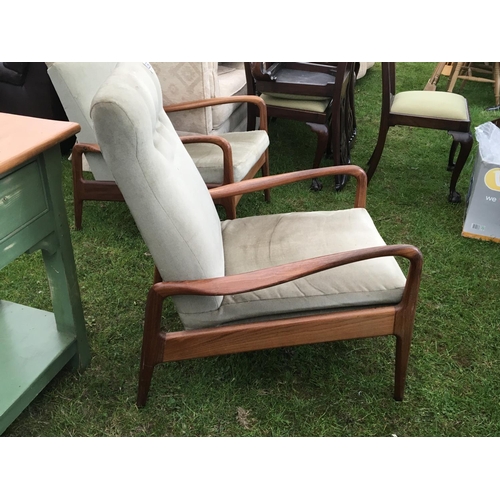 268 - Two modern design Teak Arm chairs one reclining with shaped arms Possibly Danish. (2)