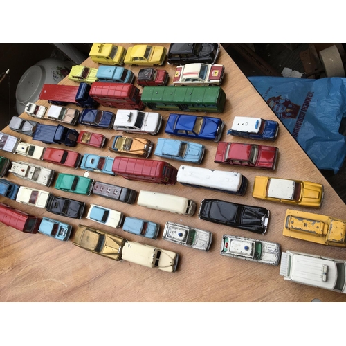 285 - A collection of playworn diecast vehicles including Dinky