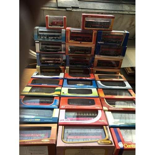 297 - A collection of boxed diecast vehicles including Buses