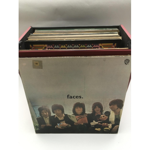 104 - A record box of LPs by various artists including The Beatles, Beach Boys, The Faces and others.