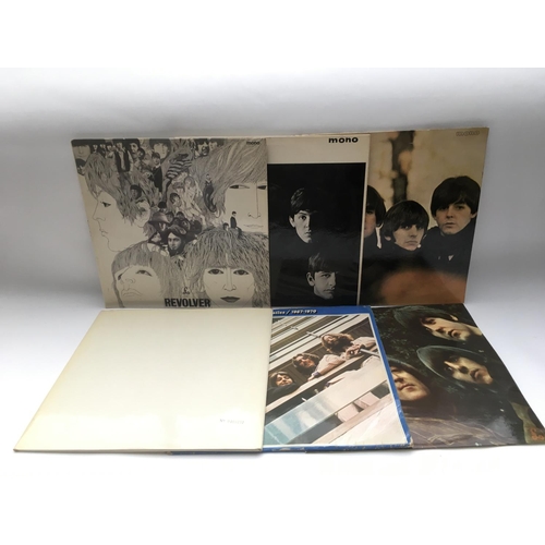 108 - Six early UK pressings of Beatles LPs including a numbered stereo 'White Album', 'Rubber Soul', 'Rev... 