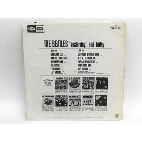 11 - A third state Beatles 'Yesterday And Today' peeled butcher sleeve T2553, sleeve has tears and areas ... 