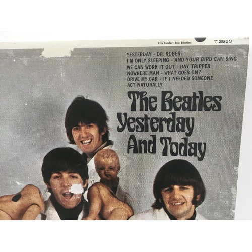 11 - A third state Beatles 'Yesterday And Today' peeled butcher sleeve T2553, sleeve has tears and areas ... 