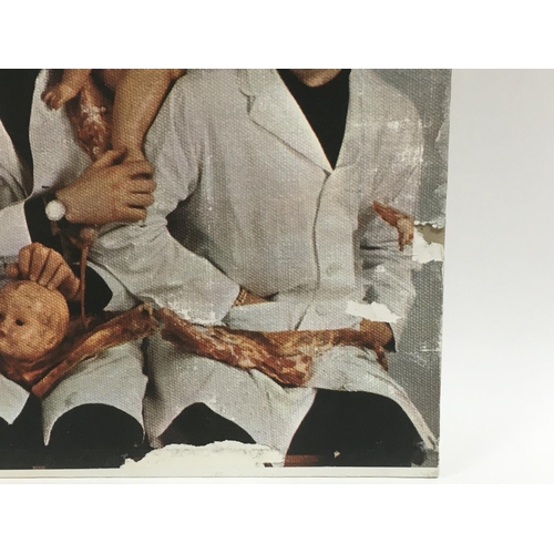 11 - A third state Beatles 'Yesterday And Today' peeled butcher sleeve T2553, sleeve has tears and areas ... 