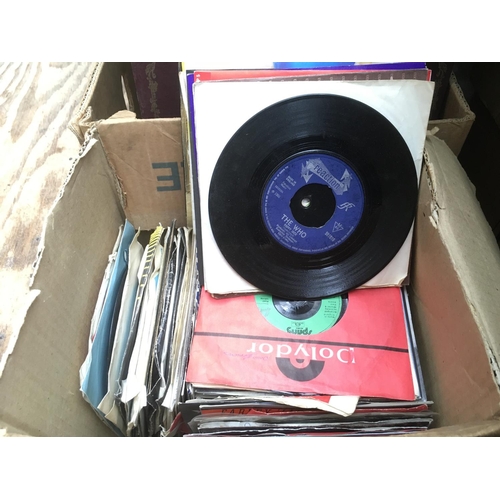 120 - A box of 7 inch singles by various artists from the 1960s onwards..