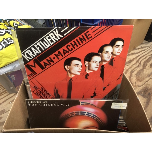 121 - A box of various LPs, 12 inch and. 7 inch singles, mainly 1980s.