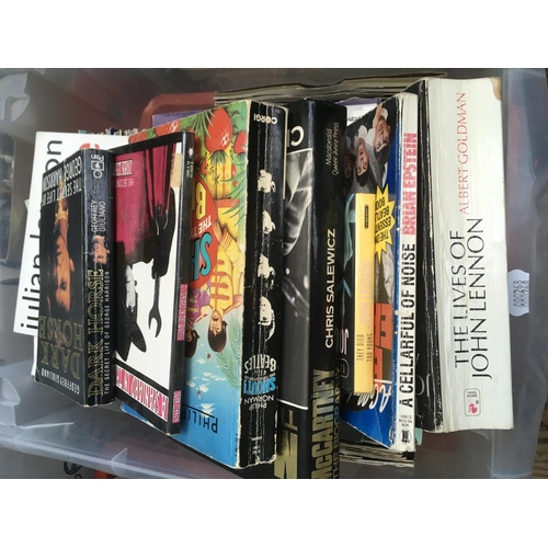 140 - Two boxes of 7 inch singles mainly from the 1980s and 90s plus a small collection of Beatles books.