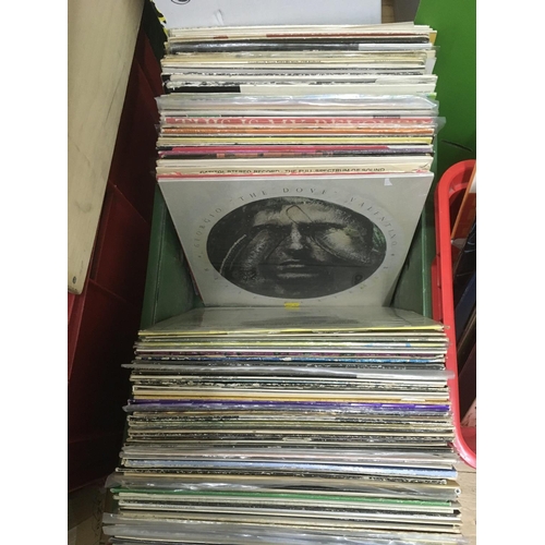 184 - A collection of LPs and 12 inch singles by various artists including Jethro Tull, Dave Edmunds, Gene... 