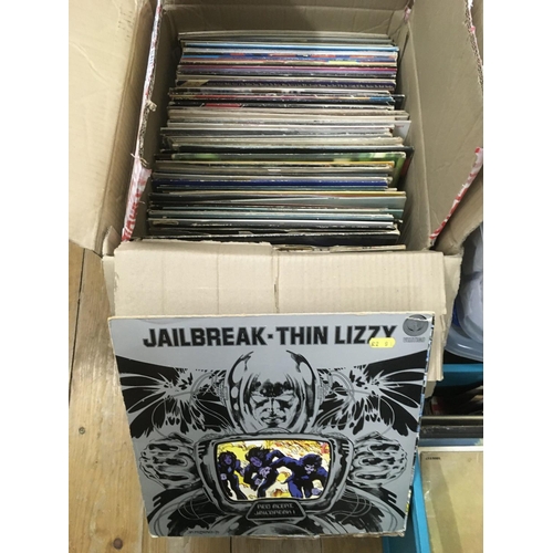 185 - Two boxes of LPs and 7 inch singles by various artists including Patti Smith, The Jam, Queen and oth... 