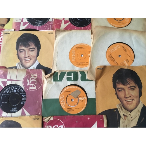 202 - A record box containing Elvis Presley 7inch singles and EPs and seven Elvis monthly magazines.