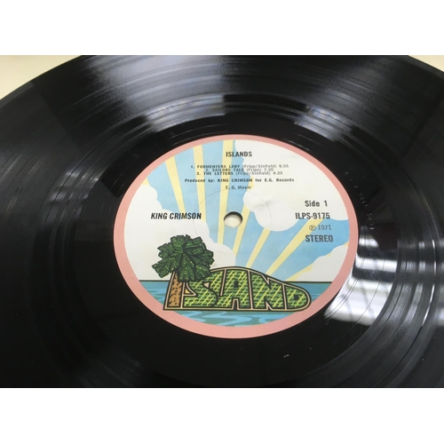 209 - Two King Crimson LPs comprising 'Islands' and 'Larks Tongues In Aspic'. Condition of vinyl is genera... 