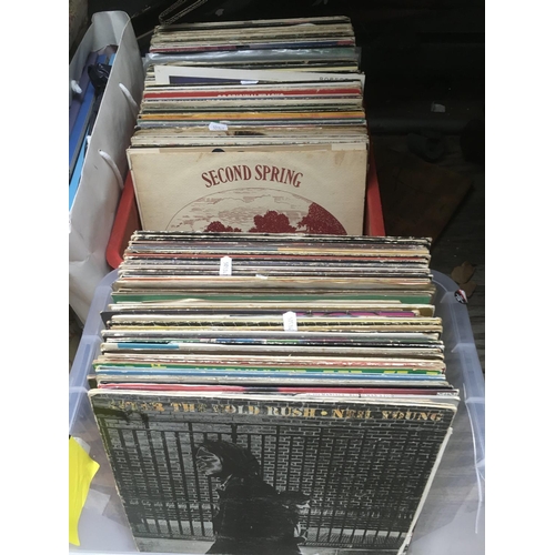 210 - Two boxes of LPs and. 12 inch singles by various artists including U2, OMD, Marc Almond, Ultravox an... 