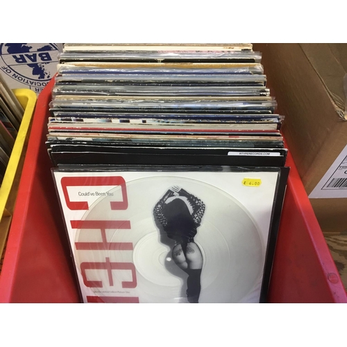 214 - A box of LPs and 12 inch singles by various artists including George Harrison, T Rex, Scorpions and ... 