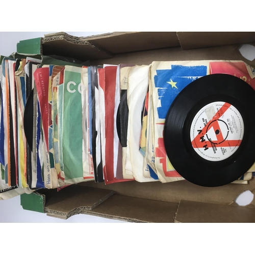 225 - A collection of 7 inch singles by various artists including