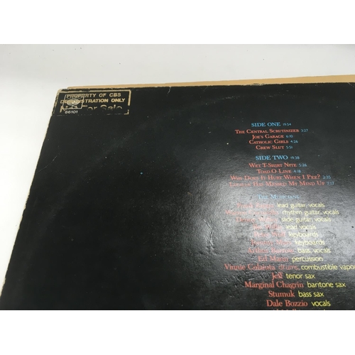 230 - Three Frank Zappa LPs comprising 'Joe's Garage' (demonstration copy), 'Apostrophe' and 'Zappa In New... 