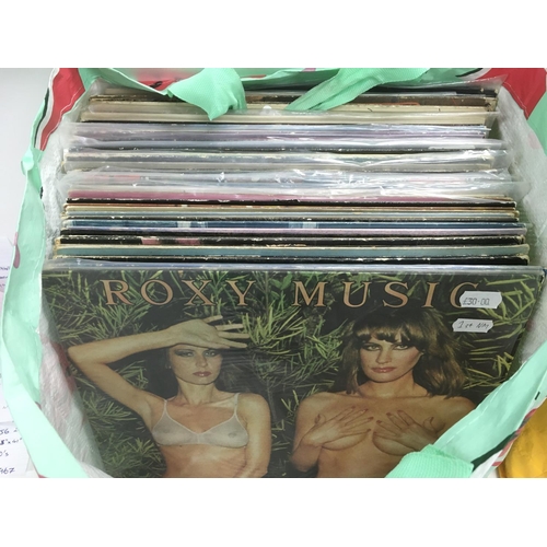 239 - A collection of rock and pop LPs by various artists including Genesis, Rixy Music, Focus and others.