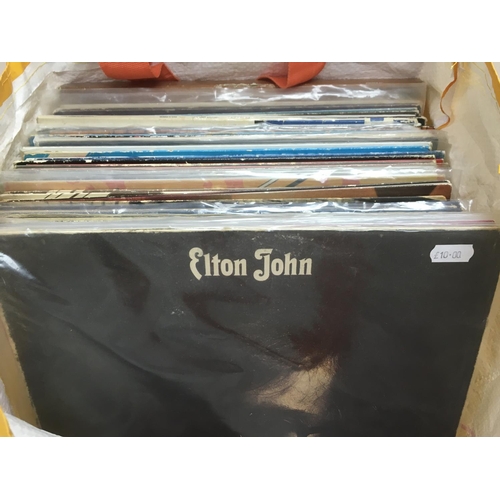 240 - A collection of rock and pop LPs by various artists including Ry Cooder, Elton John, Eric Clapton an... 