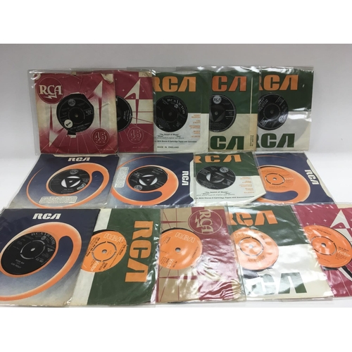 250 - A collection of Elvis Presley 7 inch singles and EPs.