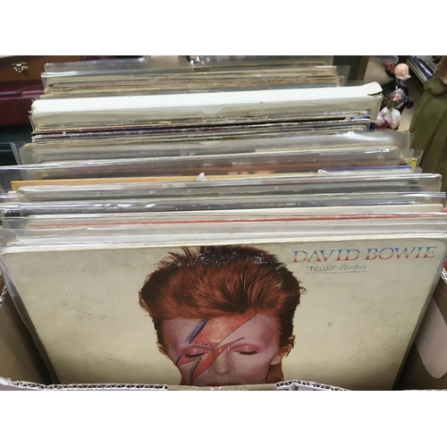 259 - A collection of LPs by various artists including David Bowie, The Kinks, Bob Marley and others.