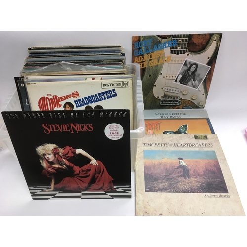 263 - A box of LPs by various artists including Rory Gallagher, Tom Petty, Stevie Nicks, Heart and others.