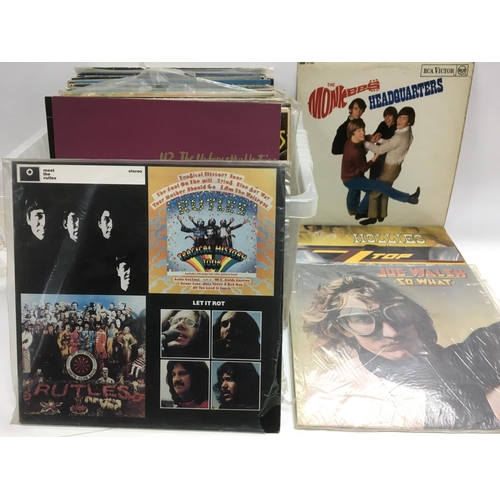 263 - A box of LPs by various artists including Rory Gallagher, Tom Petty, Stevie Nicks, Heart and others.