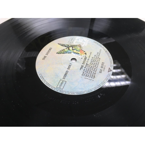 271 - Two LPs by The Doors comprising the self titled debut ELK 42012 and 'The Sift Parade' K 42 079. Both... 